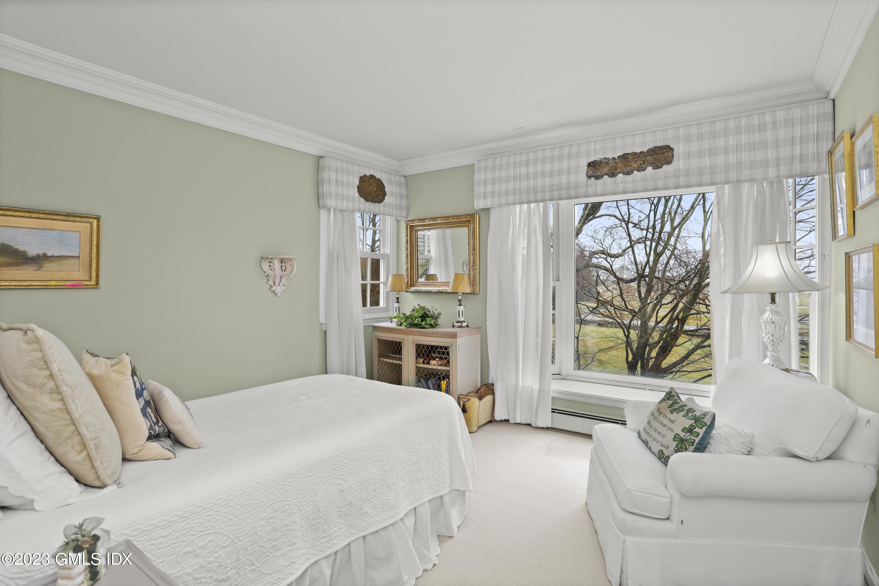 36 Golf Club Road Greenwich, CT 06830 - Photo 22 of 32 a bedroom with a bed and a couch