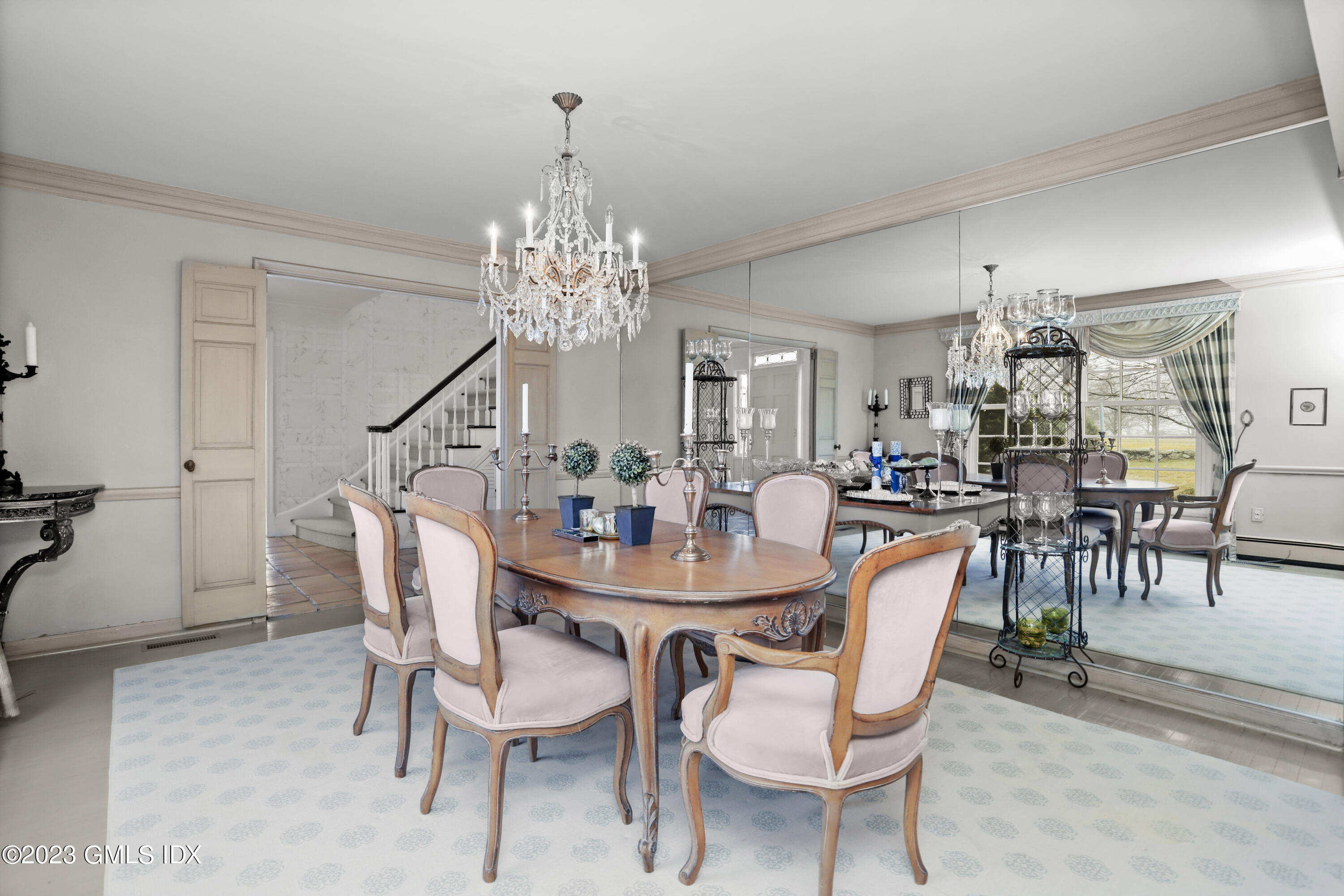 36 Golf Club Road Greenwich, CT 06830 - Photo 9 of 32 a view of a dining room with furniture and chandelier