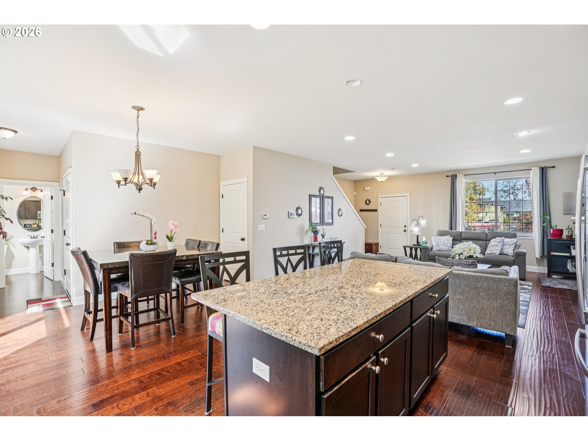 16958 Southwest Kavitt Lane Beaverton, OR 97078 - Photo 12 of 30 a kitchen with a table and chairs