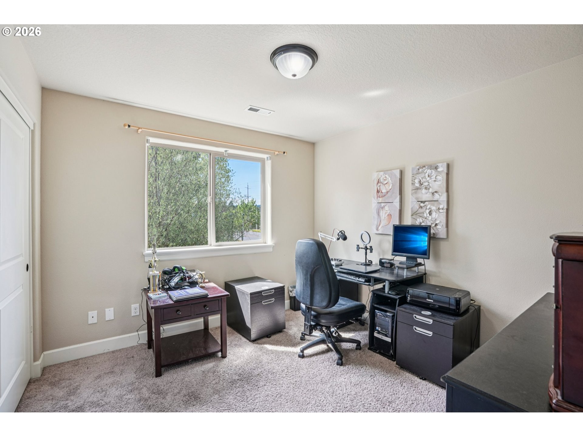 16958 Southwest Kavitt Lane Beaverton, OR 97078 - Photo 19 of 30 a workspace with furniture and a window
