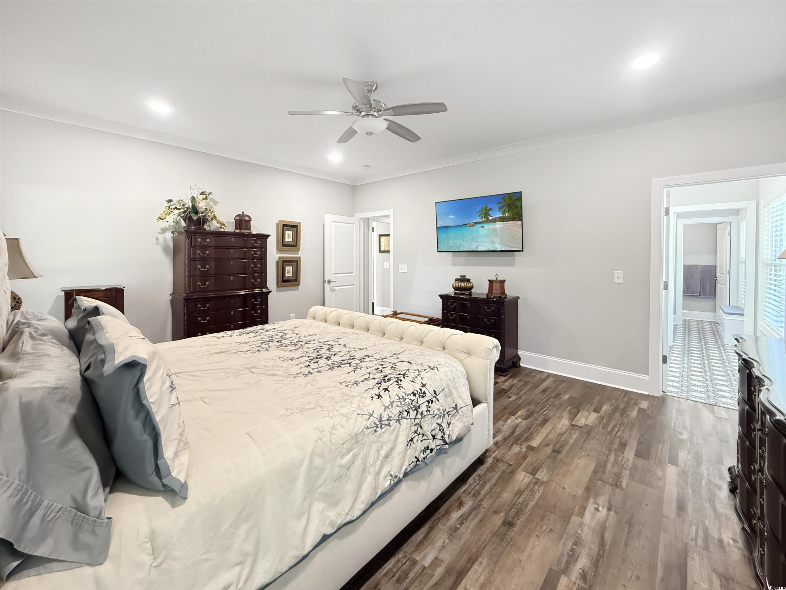 521 Oak Lawn Road Georgetown, SC 29440 - Photo 23 of 40 Bedroom featuring dark wood-style flooring, crown molding, recessed lighting, and ceiling fan