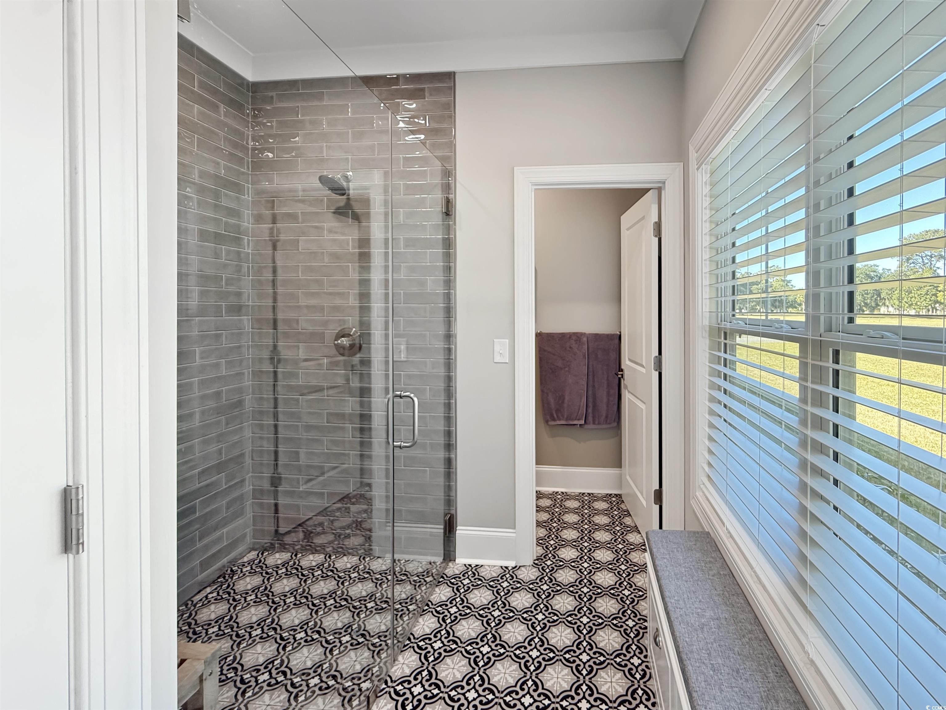 521 Oak Lawn Road Georgetown, SC 29440 - Photo 26 of 40 Bathroom featuring a stall shower and baseboards