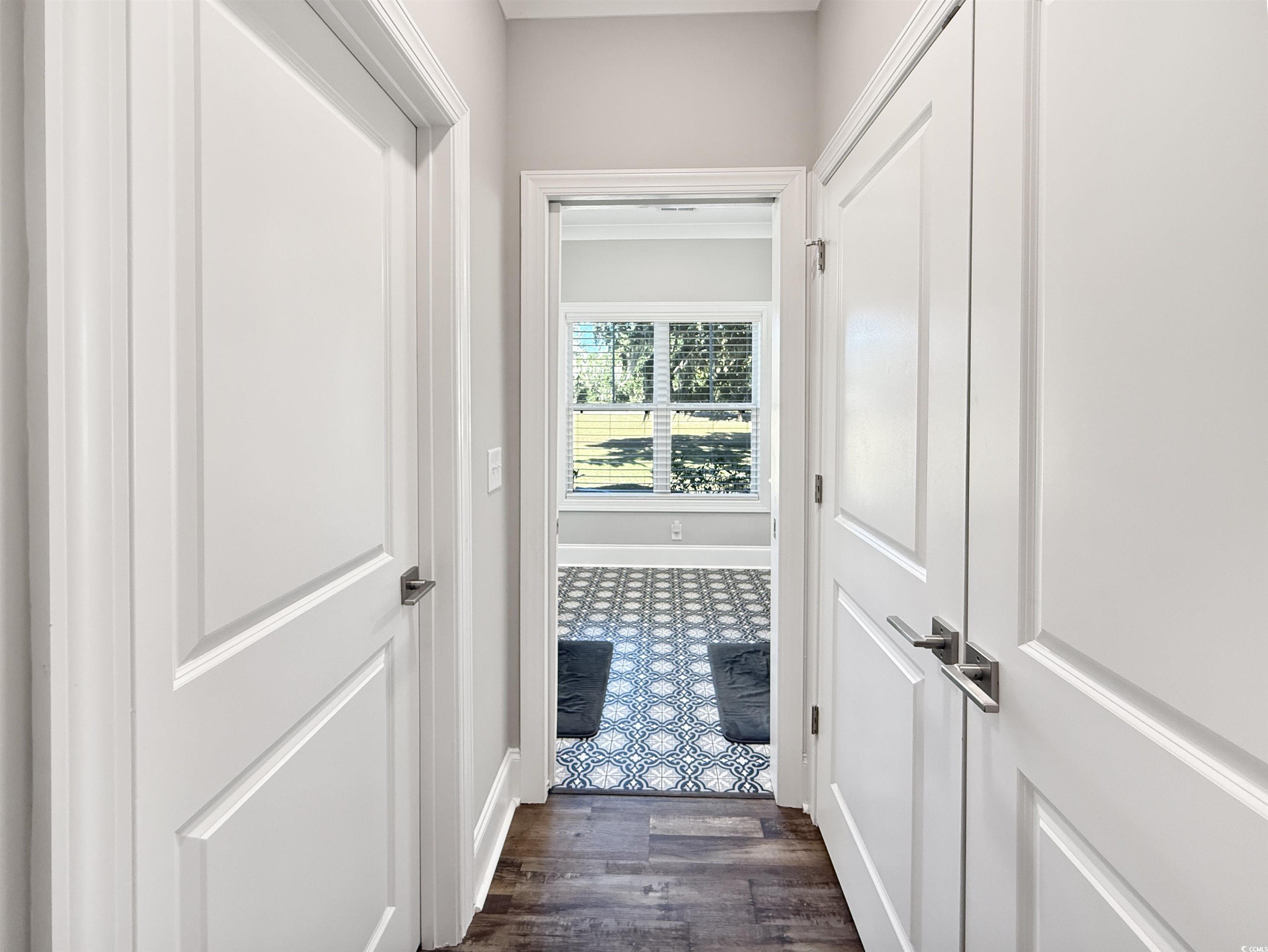 521 Oak Lawn Road Georgetown, SC 29440 - Photo 28 of 40 Hall featuring baseboards and dark wood-type flooring