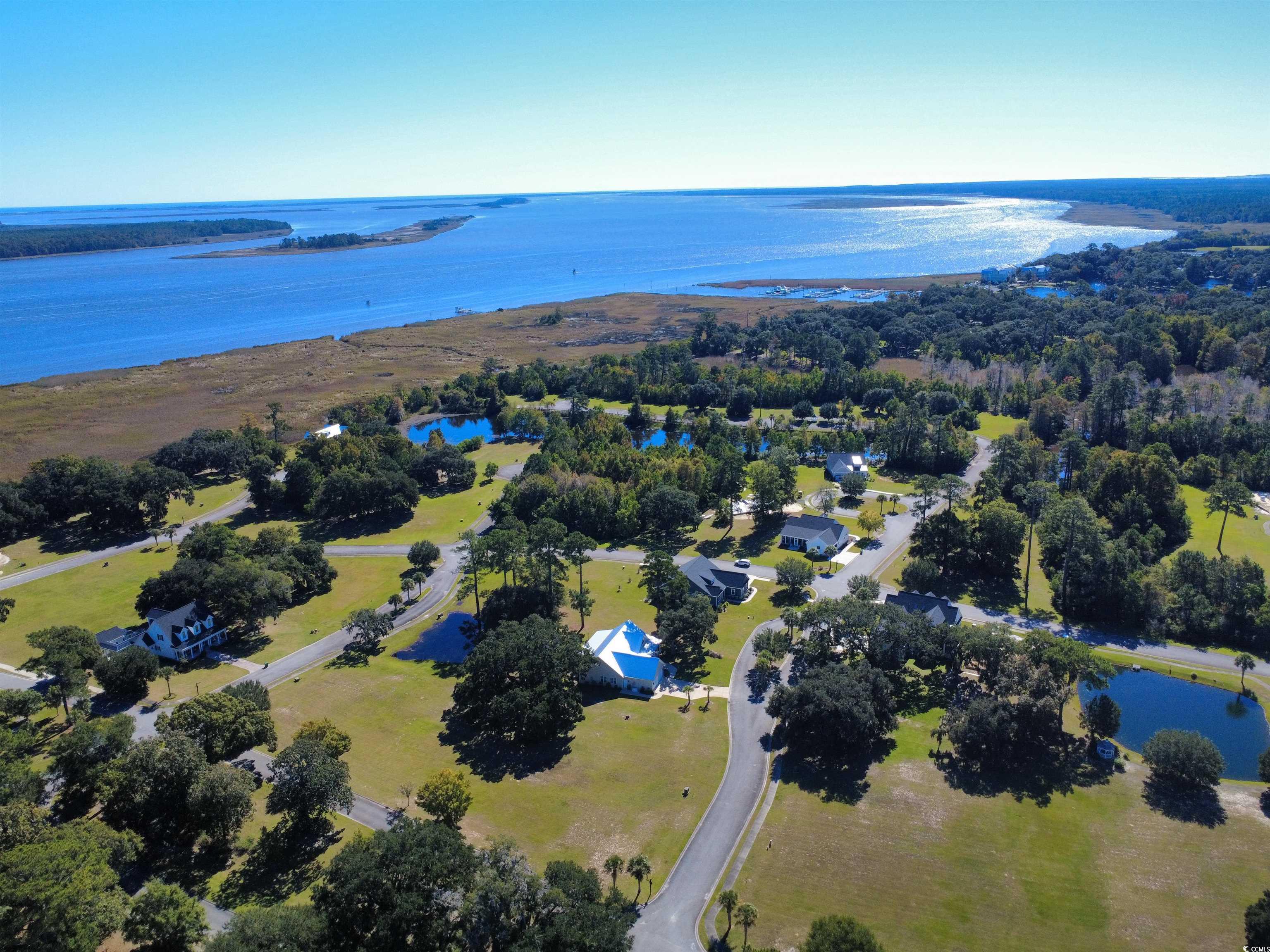 521 Oak Lawn Road Georgetown, SC 29440 - Photo 32 of 40 Aerial overview of property's location featuring a large body of water