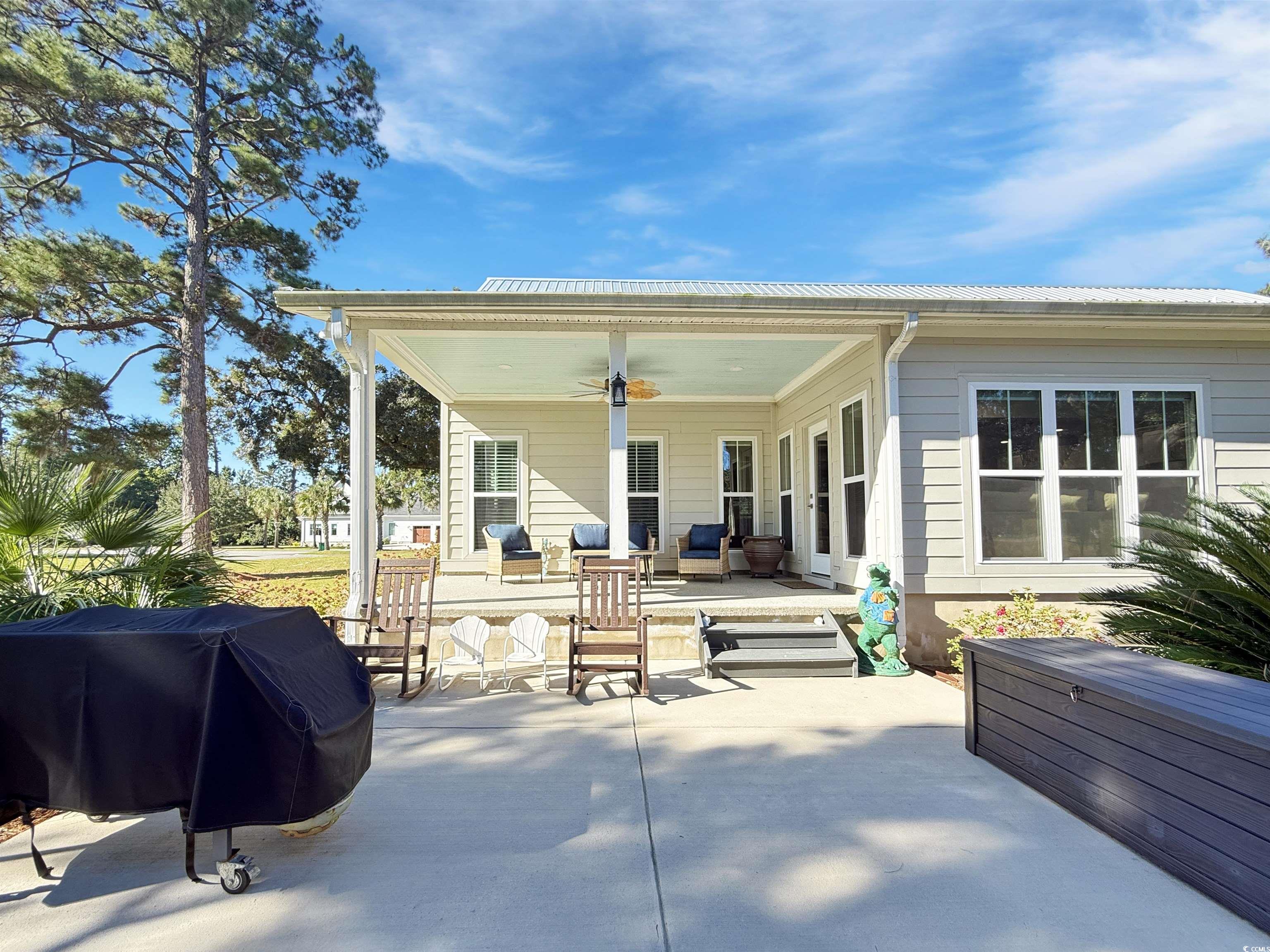 521 Oak Lawn Road Georgetown, SC 29440 - Photo 4 of 40 View of patio / terrace with grilling area, a ceiling fan, and outdoor lounge area