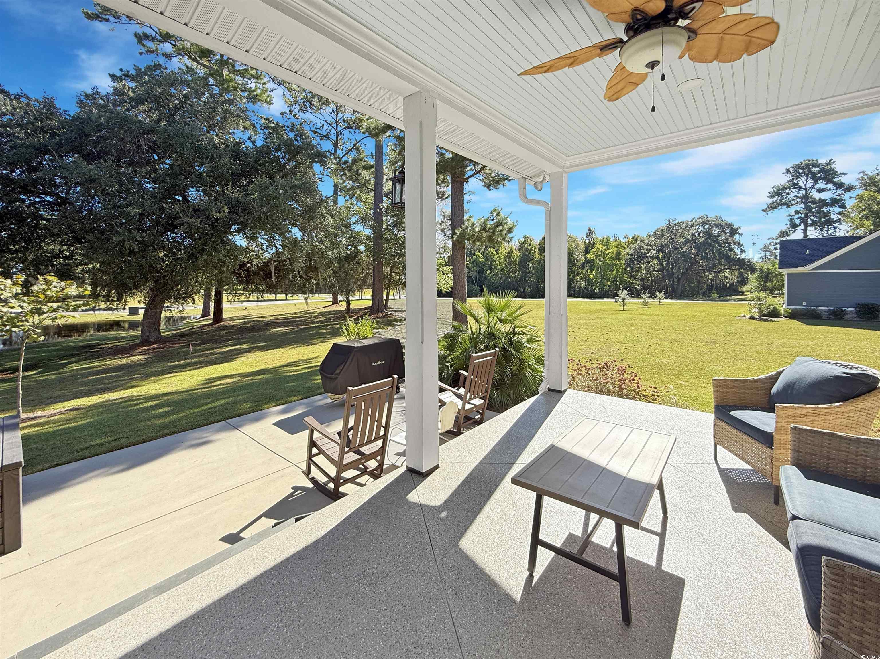 521 Oak Lawn Road Georgetown, SC 29440 - Photo 6 of 40 View of patio with ceiling fan