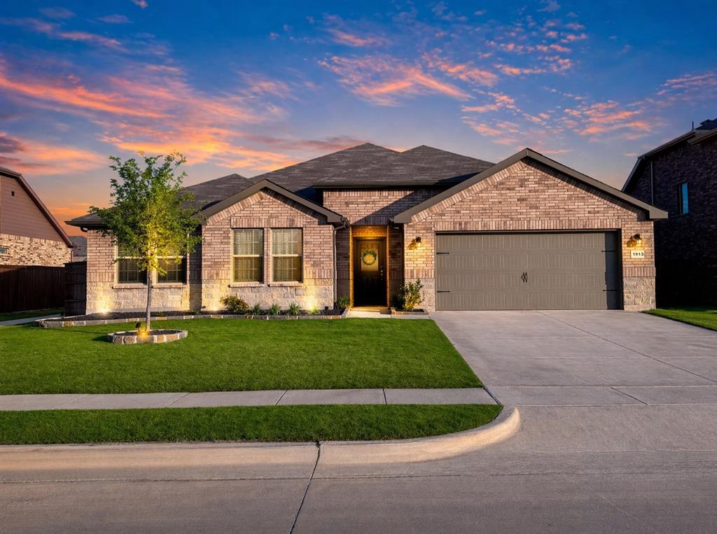 1913 Cookes Lane Cleburne, TX 76033 - Photo 1 of 20 a view of a big house with a big yard and potted plants
