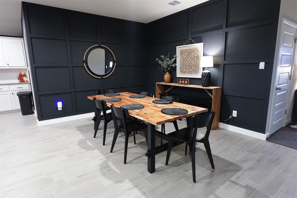 1913 Cookes Lane Cleburne, TX 76033 - Photo 6 of 20 a dining room with a table and chairs