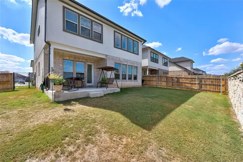 a view of a building with a yard