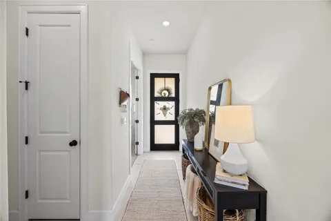 a view of a livingroom with furniture and wooden floor