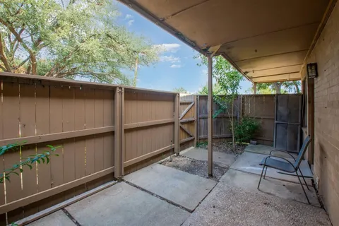a view of a back yard of the house