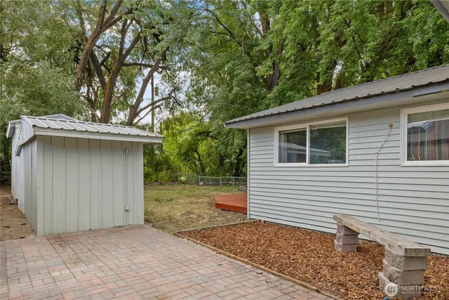 a view of a swimming pool with a deck
