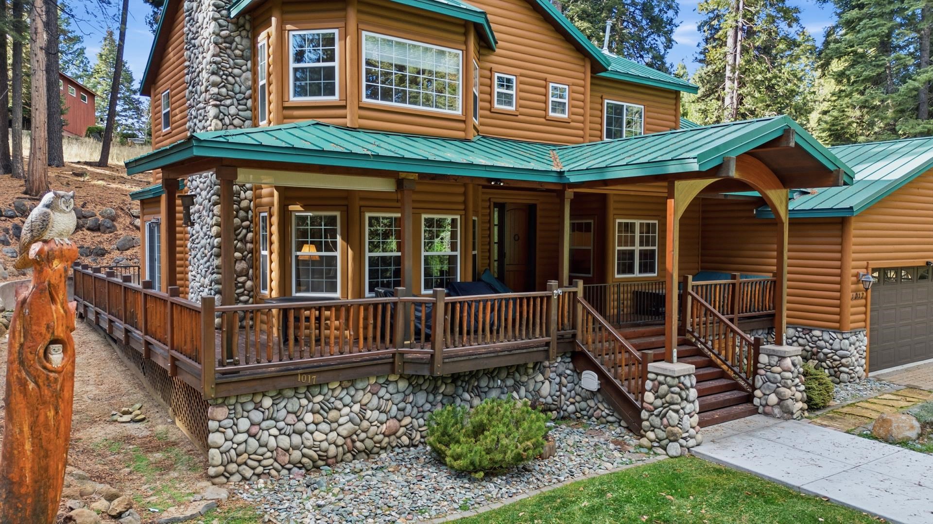 1017 Timber Ridge Road Lake Almanor, CA 96137 - Photo 38 of 45 front view of a house with a fence