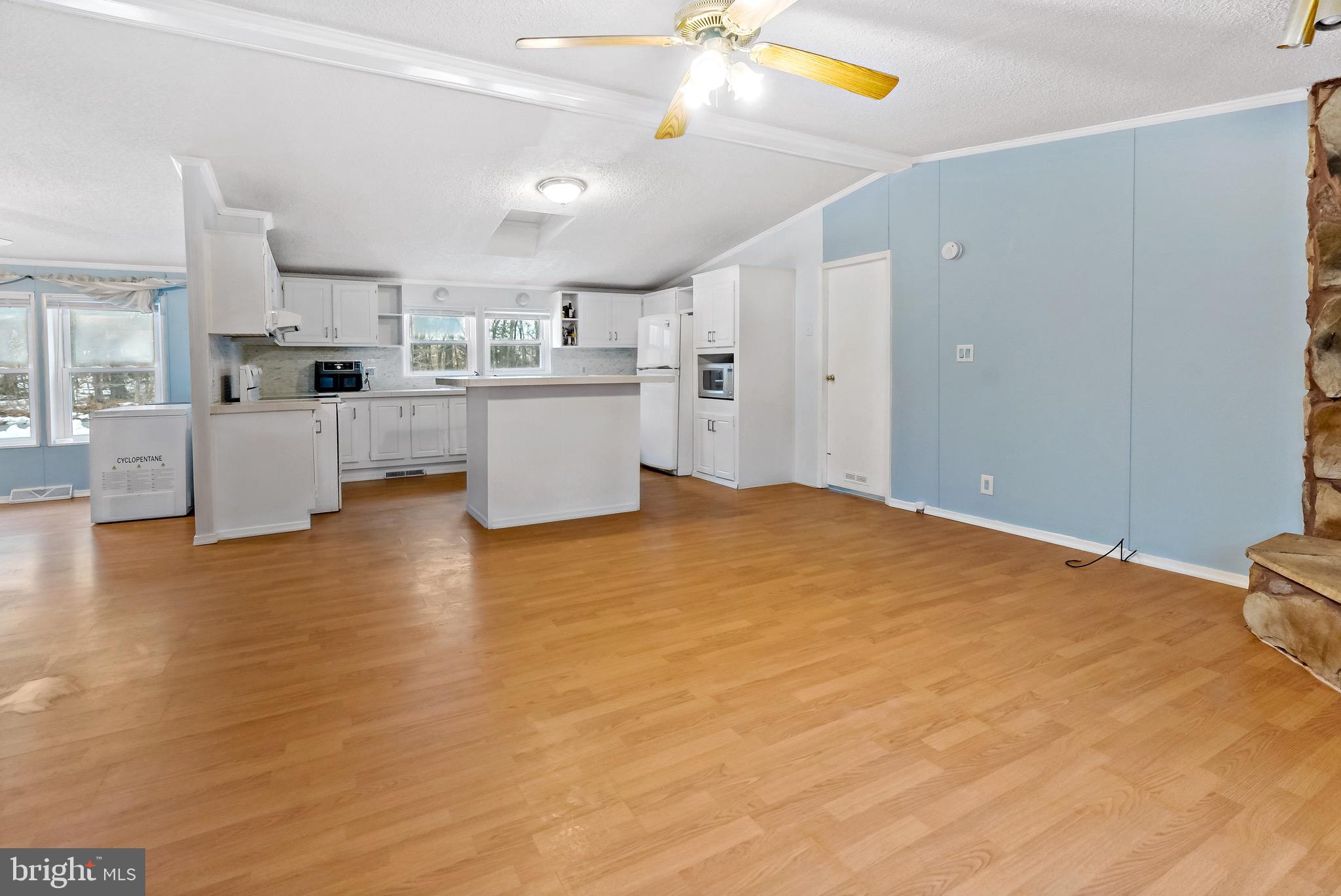 233 Short Road Kearneysville, WV 25430 - Photo 20 of 36 a view of a kitchen with microwave and cabinets