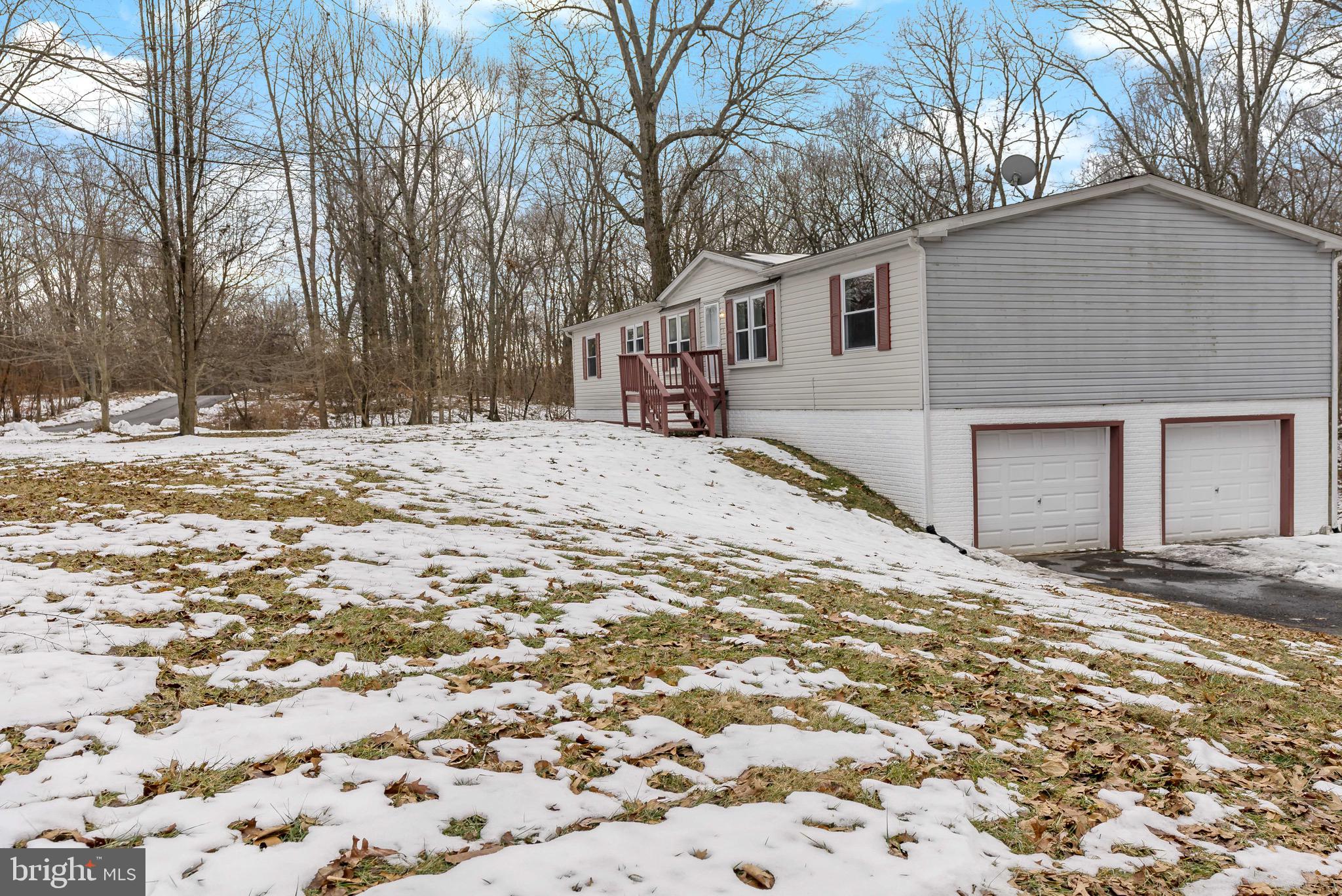 233 Short Road Kearneysville, WV 25430 - Photo 2 of 36 a view of a yard with a large tree