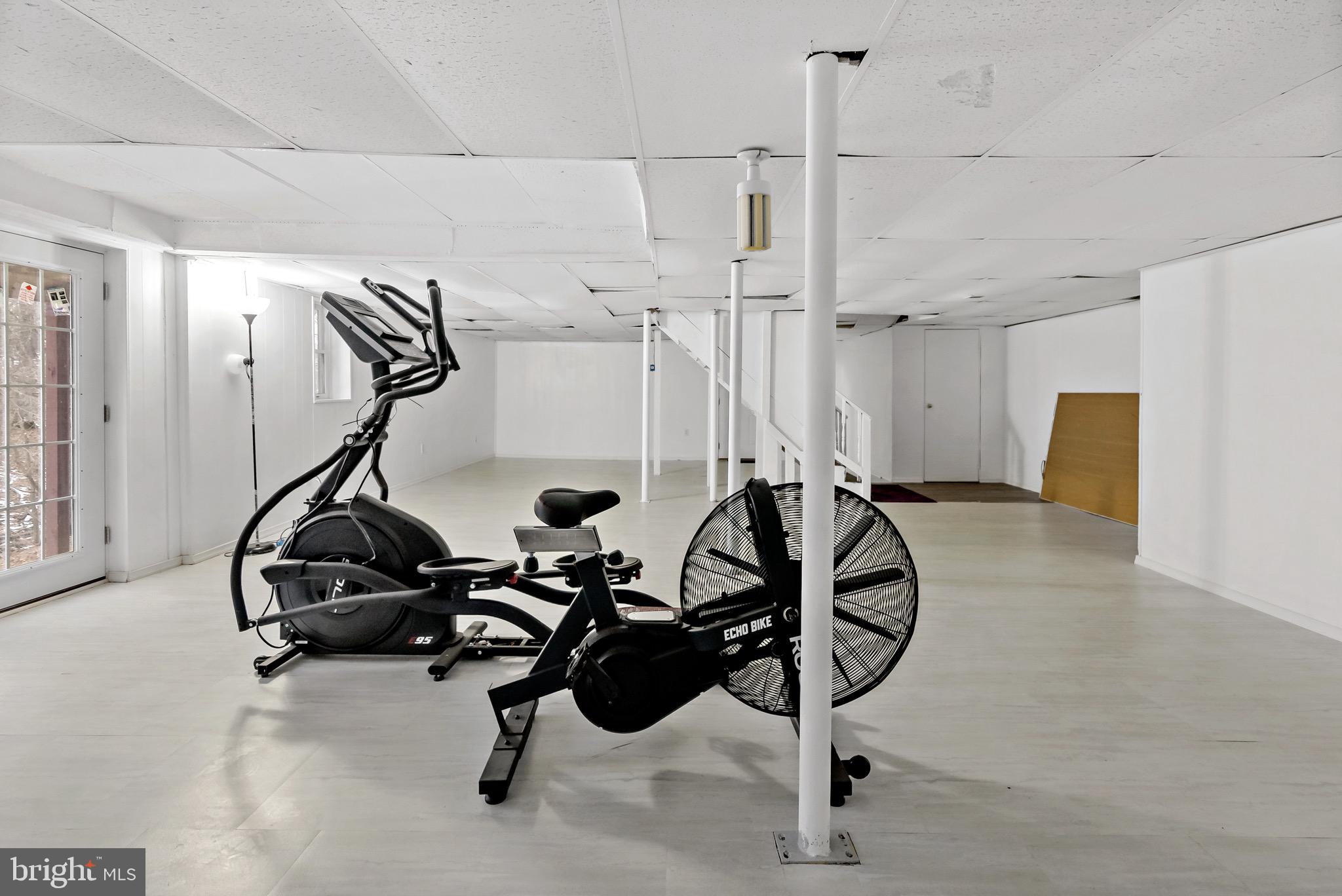 233 Short Road Kearneysville, WV 25430 - Photo 32 of 36 a view of a room with gym equipment