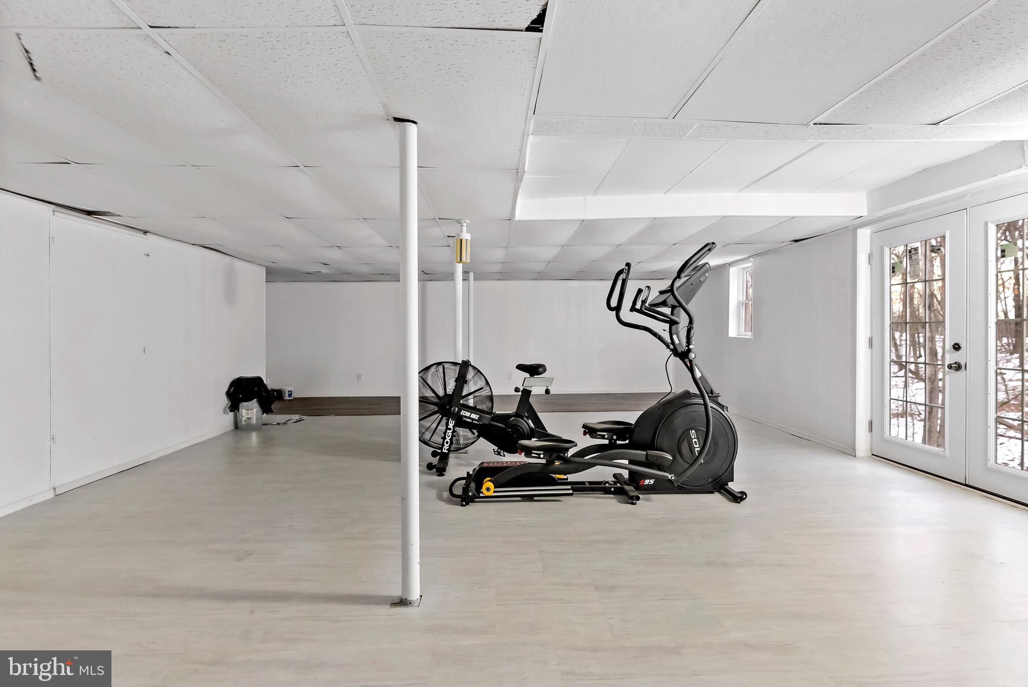 233 Short Road Kearneysville, WV 25430 - Photo 33 of 36 a view of a room with gym equipment