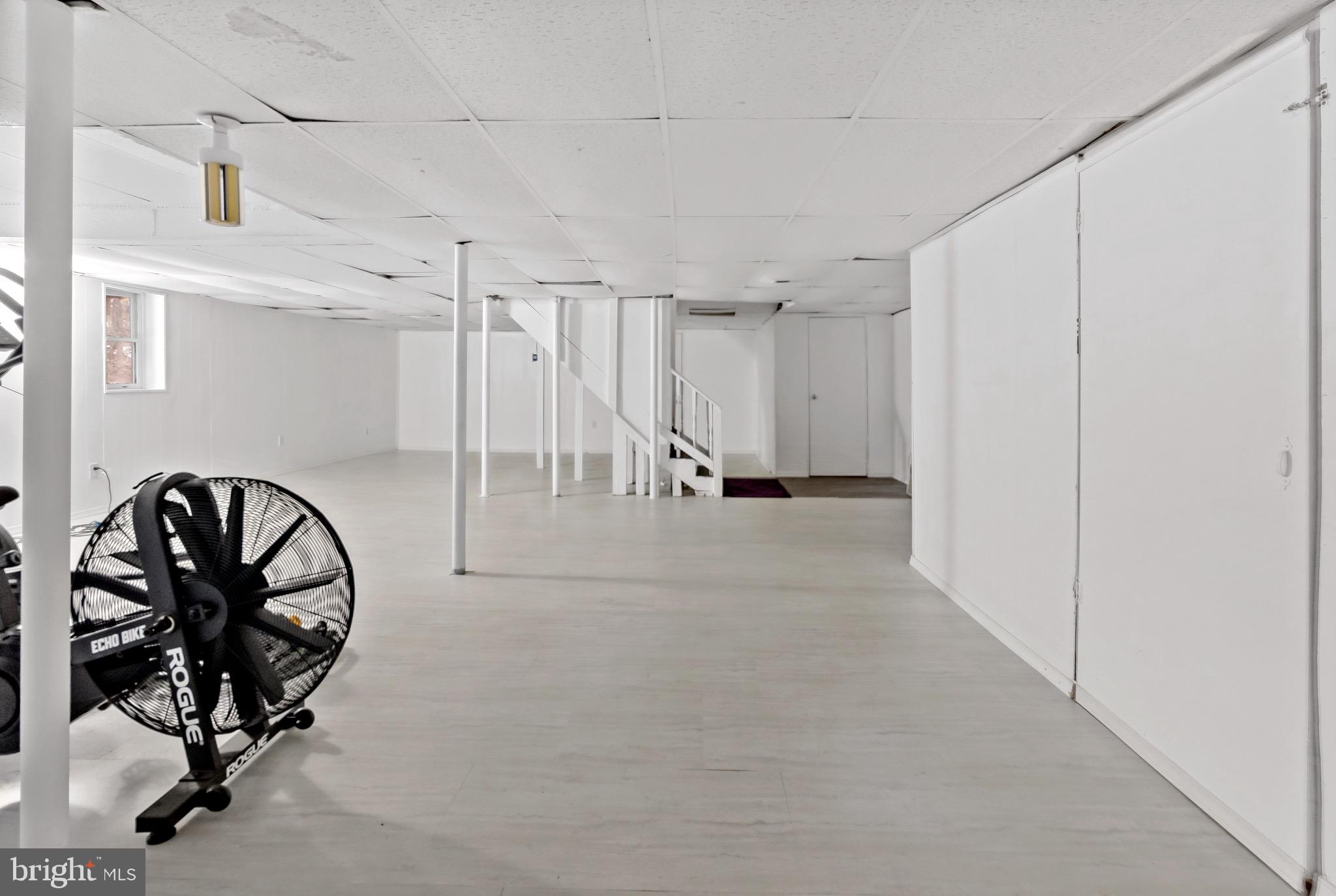 233 Short Road Kearneysville, WV 25430 - Photo 35 of 36 a view of an entryway with a table and chairs