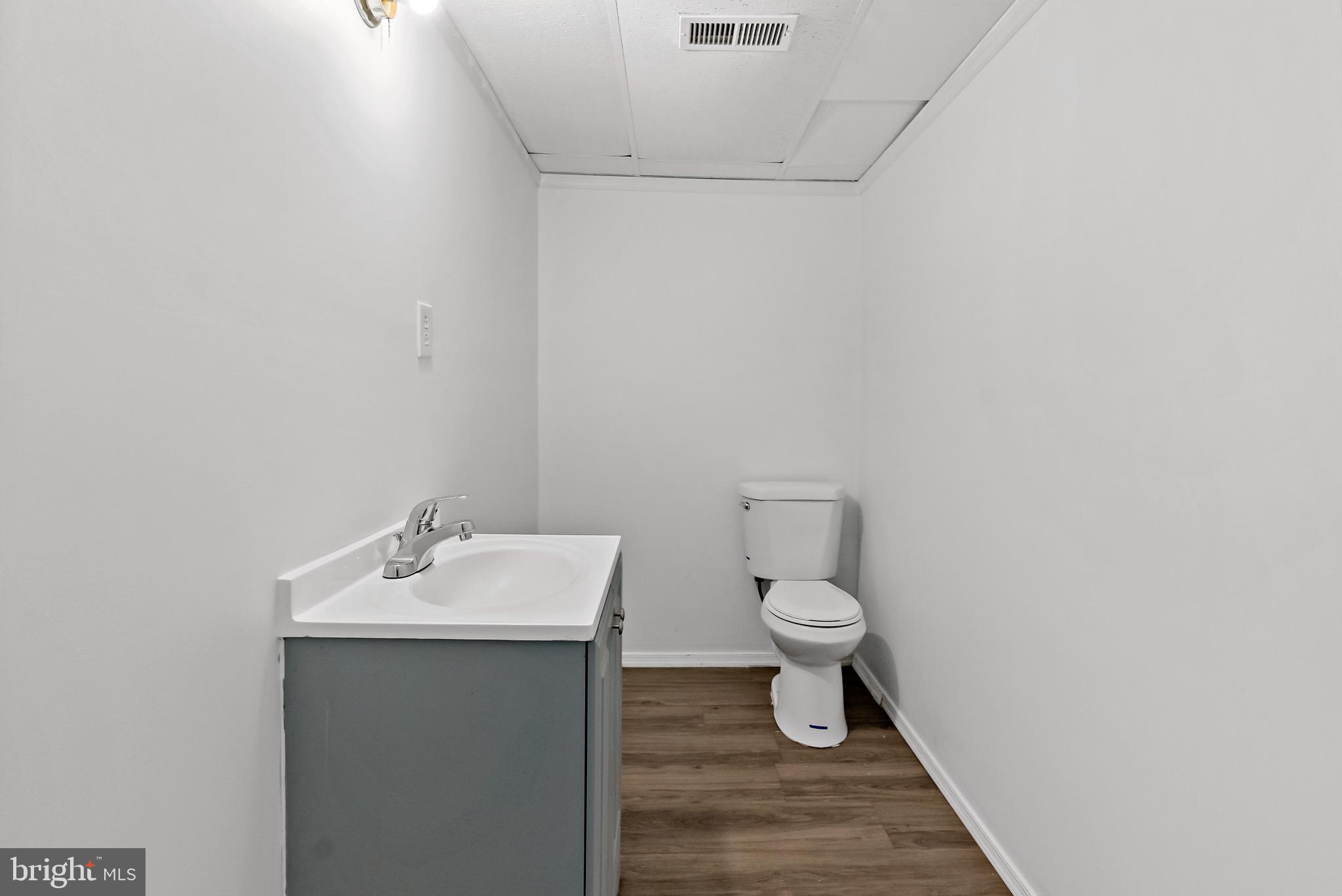 233 Short Road Kearneysville, WV 25430 - Photo 36 of 36 a bathroom with a sink mirror and toilet