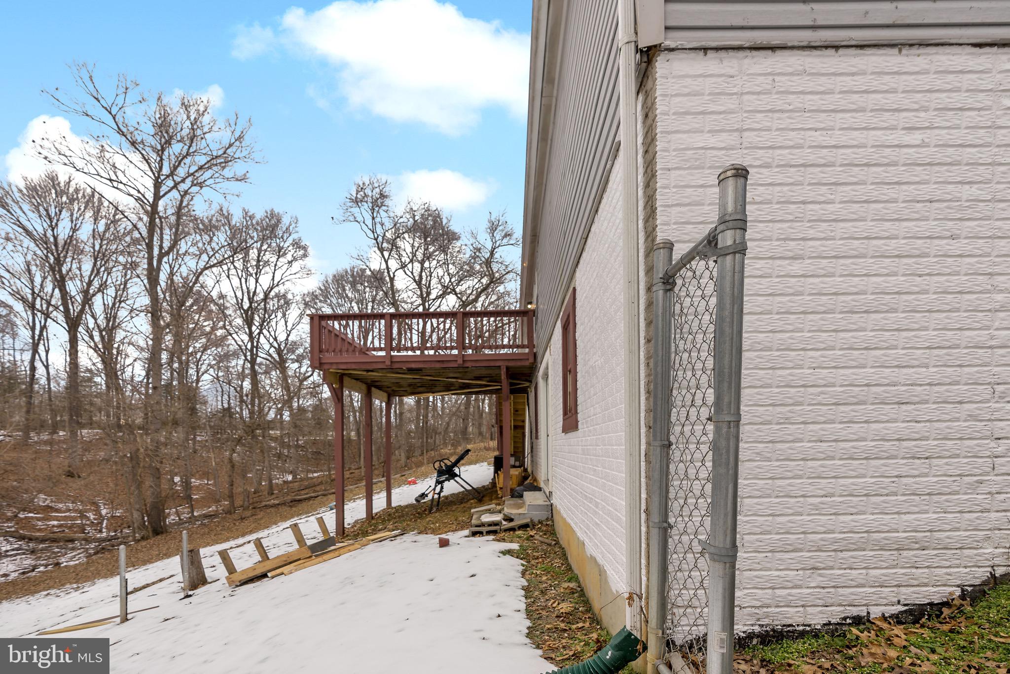 233 Short Road Kearneysville, WV 25430 - Photo 7 of 36 a view of a balcony with a tree