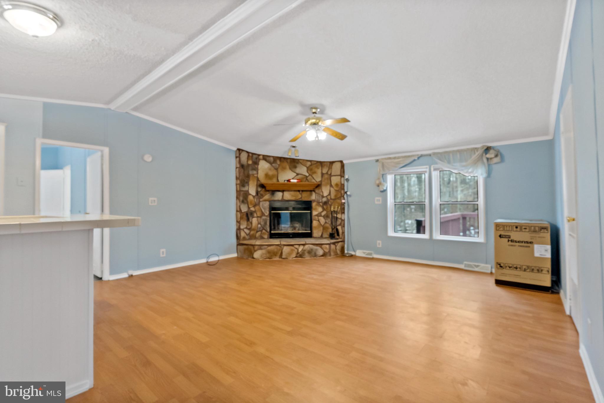 233 Short Road Kearneysville, WV 25430 - Photo 10 of 36 a view of an empty room with a window and a kitchen