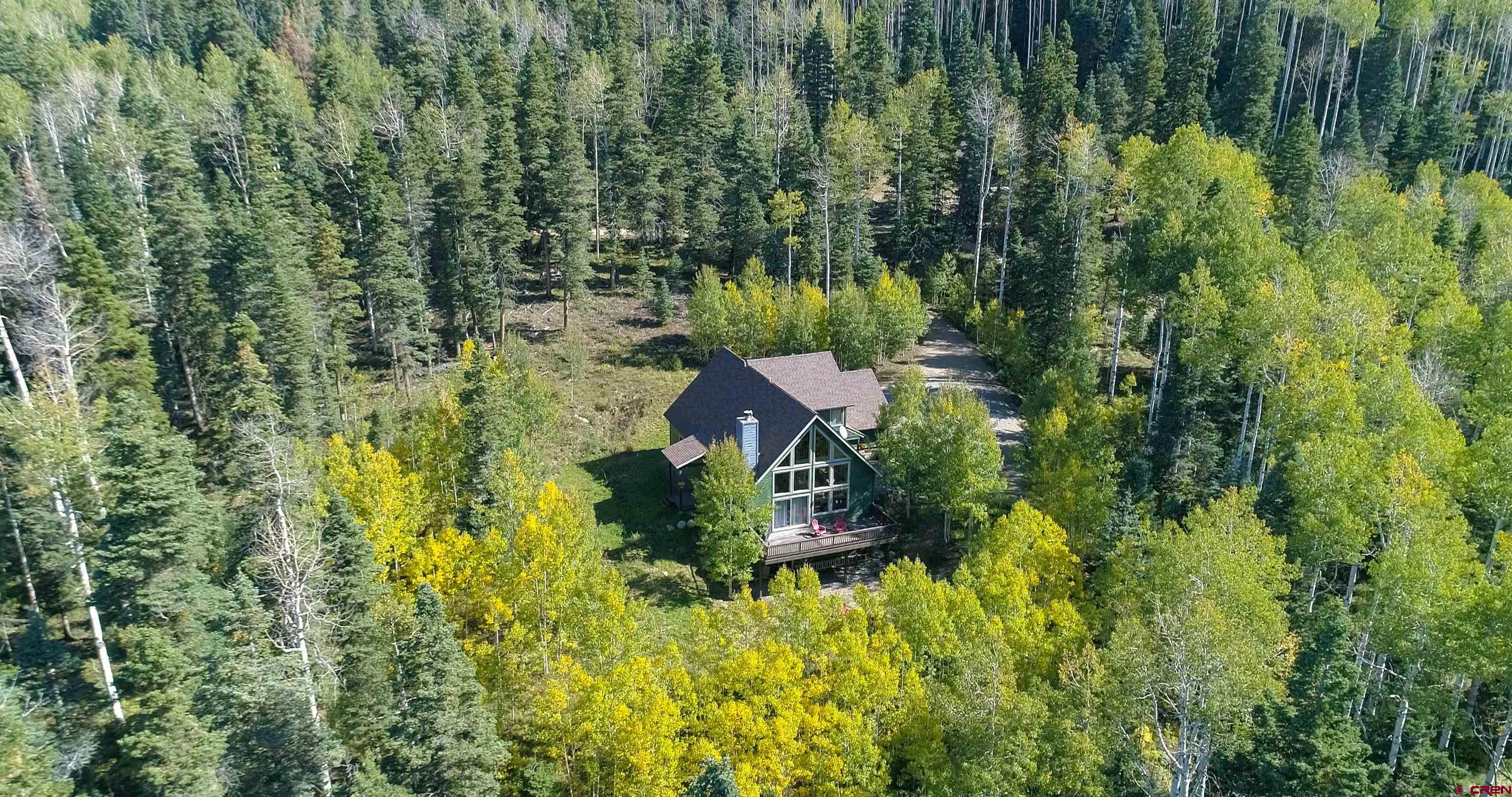 261 Aspen Drive Durango, CO 81301 - Photo 2 of 34 a view of a house with a yard