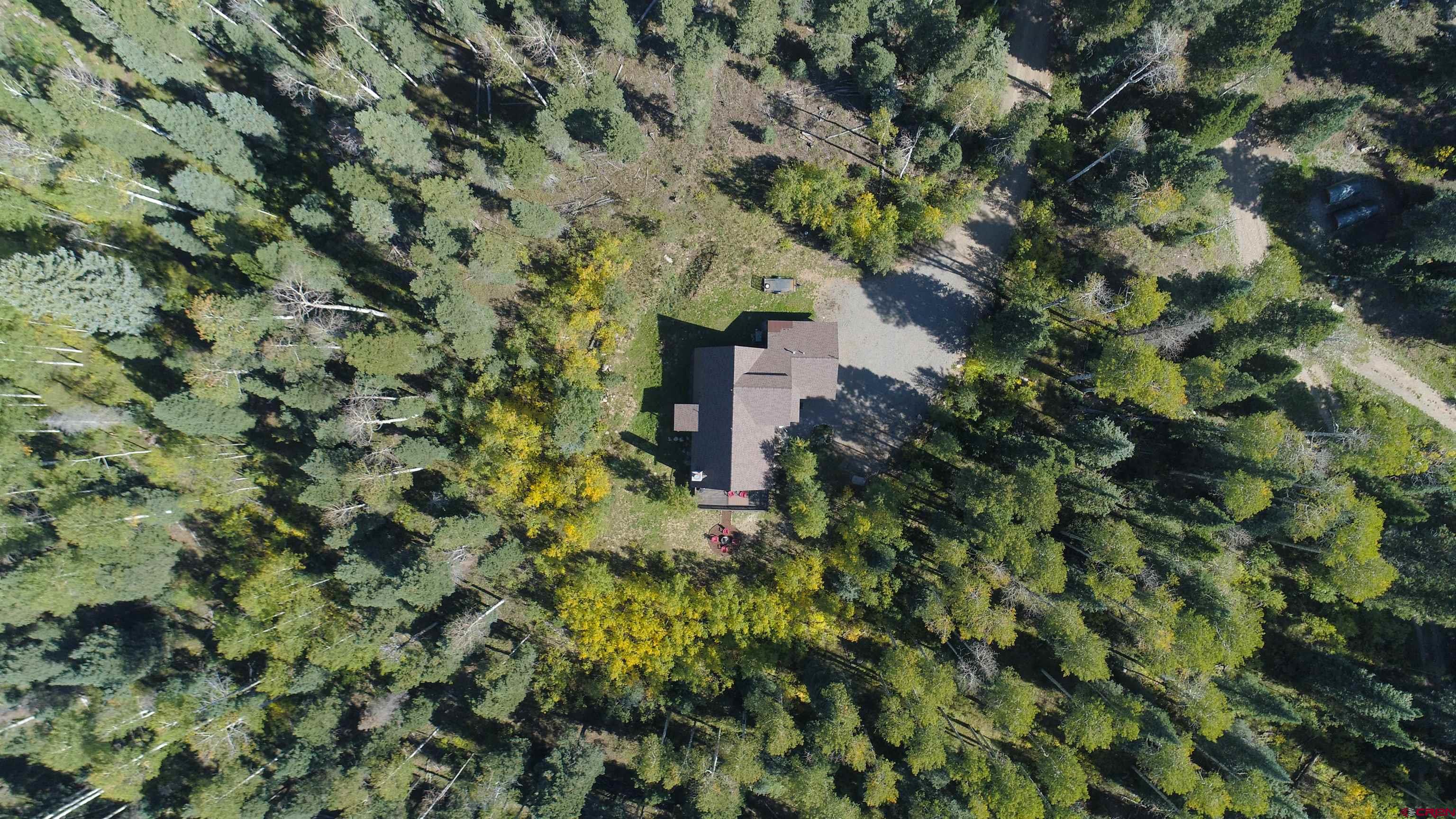 261 Aspen Drive Durango, CO 81301 - Photo 4 of 34 a view of a house with a tree