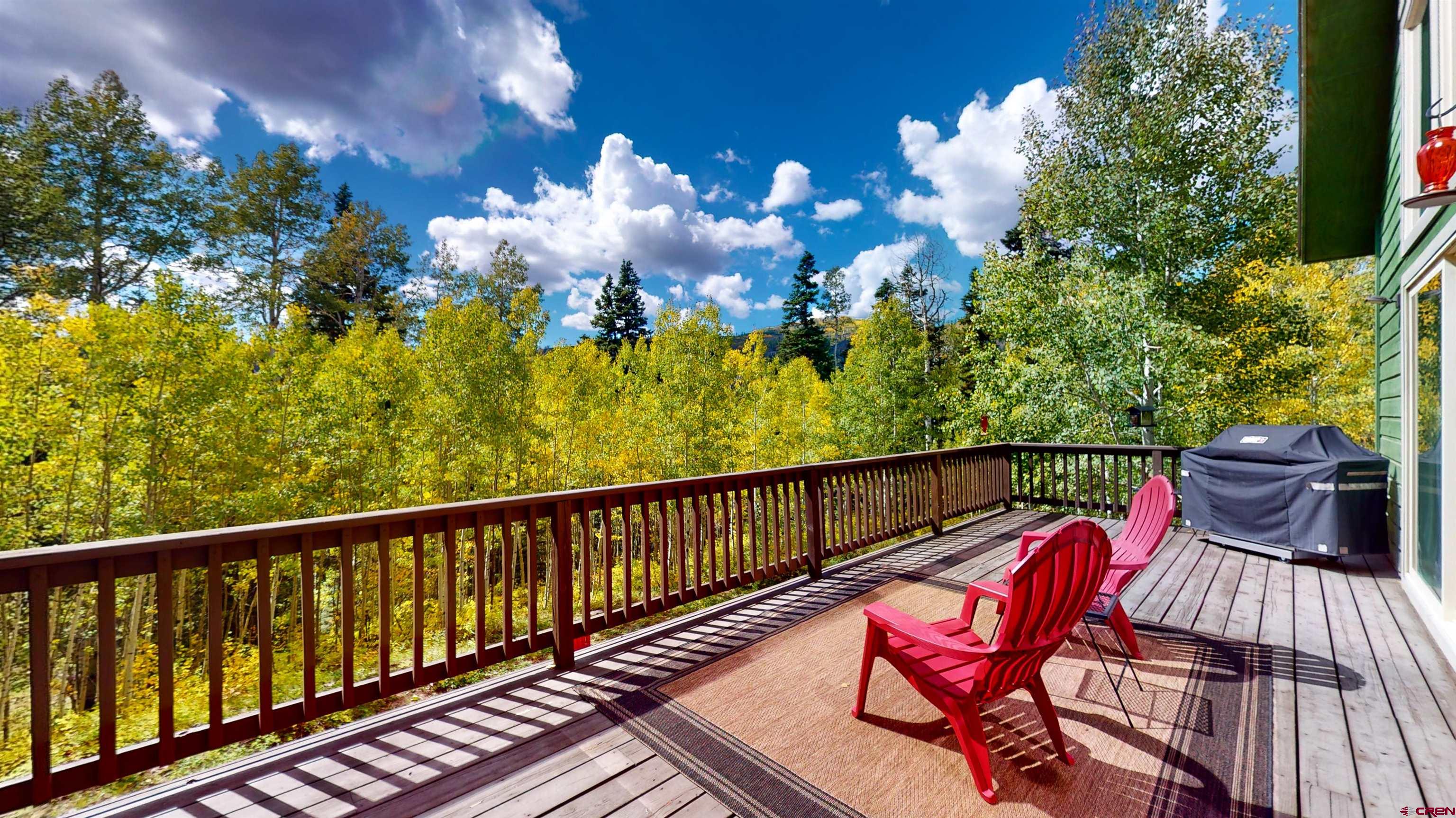 261 Aspen Drive Durango, CO 81301 - Photo 5 of 34 a view of a chairs and table in the balcony