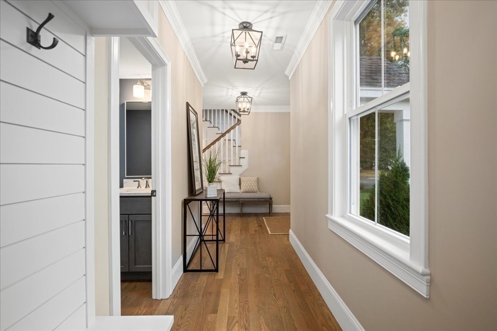 11 Waring Road Natick, MA 01760 - Photo 18 of 41 a view of entryway with wooden floor and a front door