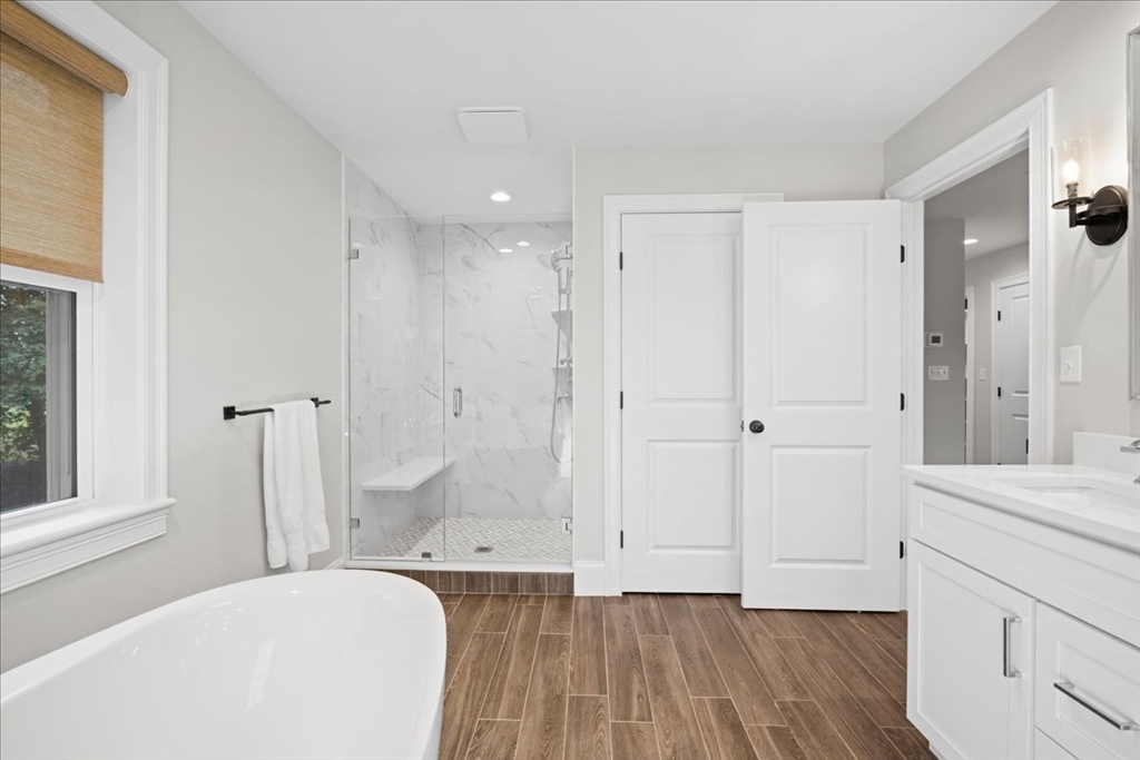 11 Waring Road Natick, MA 01760 - Photo 22 of 41 a bathroom with a sink and a mirror