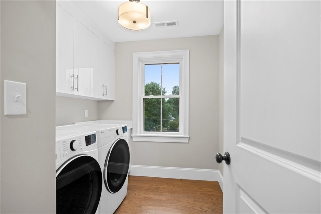 11 Waring Road Natick, MA 01760 - Photo 29 of 41 a view of livingroom with washer and dryer