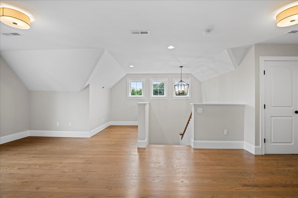 11 Waring Road Natick, MA 01760 - Photo 32 of 41 a view of empty room with wooden floor