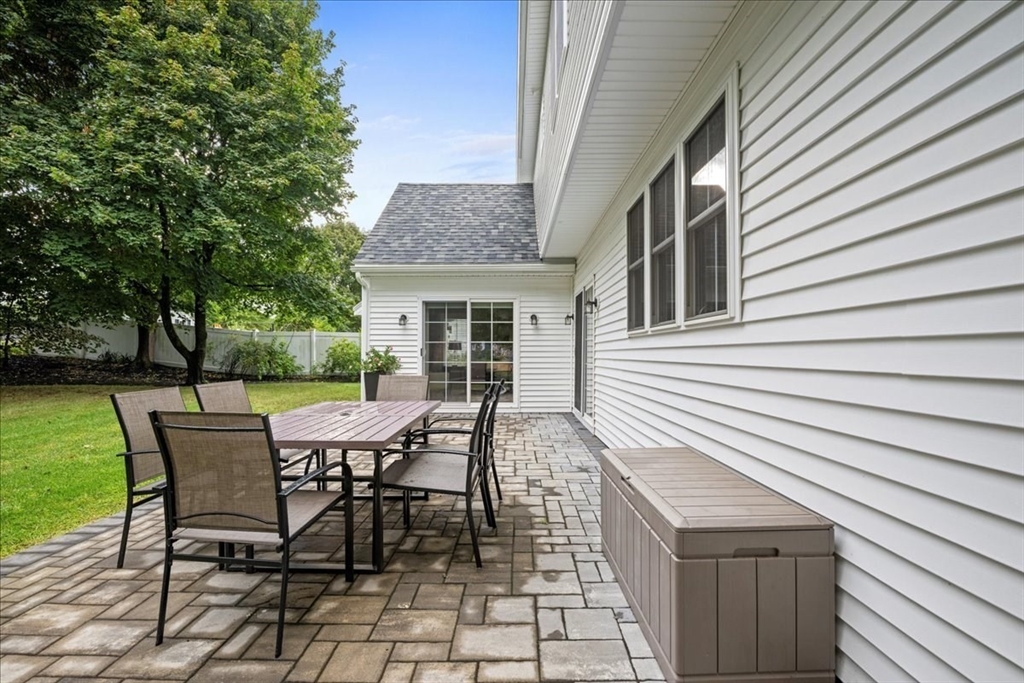 11 Waring Road Natick, MA 01760 - Photo 35 of 41 a view of a house with backyard and sitting area