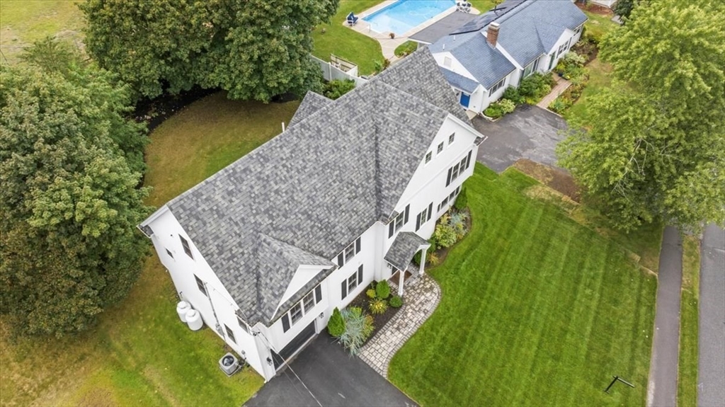 11 Waring Road Natick, MA 01760 - Photo 38 of 41 a aerial view of a house with a yard and large trees