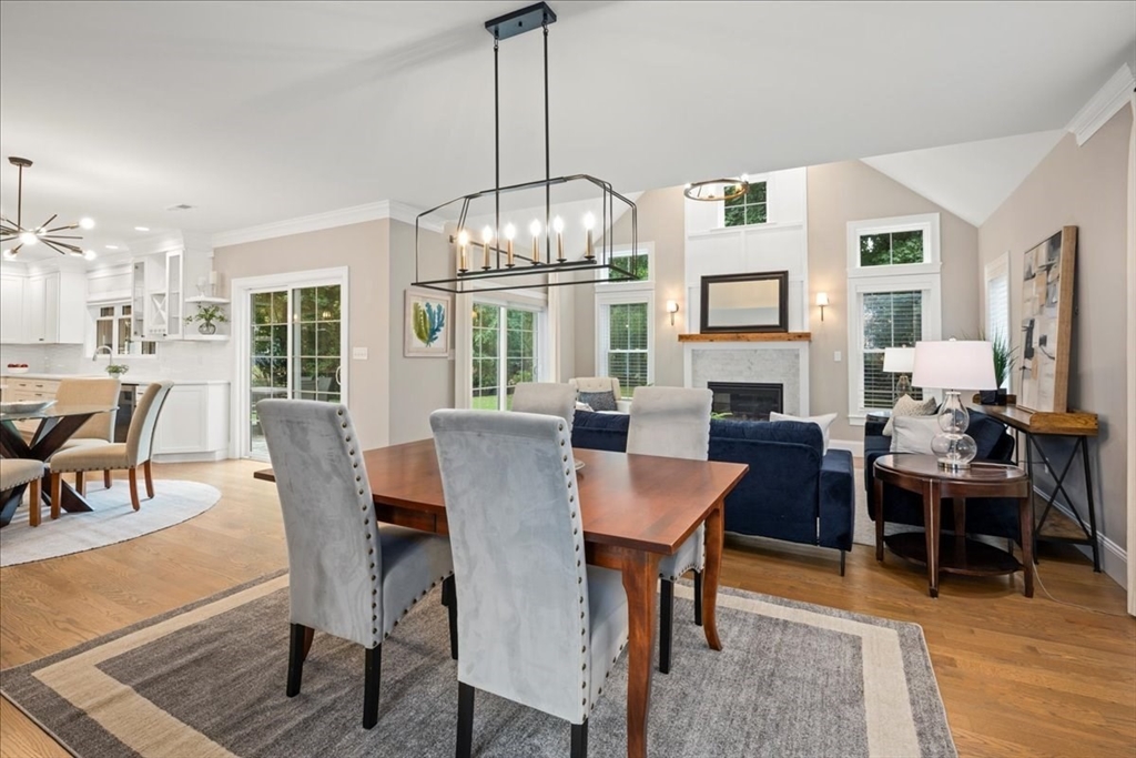 11 Waring Road Natick, MA 01760 - Photo 8 of 41 a view of a dining room with furniture a chandelier and wooden floor