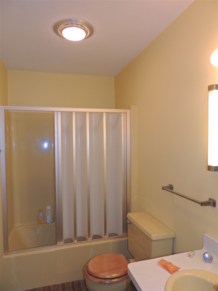 8344 South Schroeder Road Clinton, WI 53525 - Photo 11 of 25 a bathroom with a sink a toilet and shower