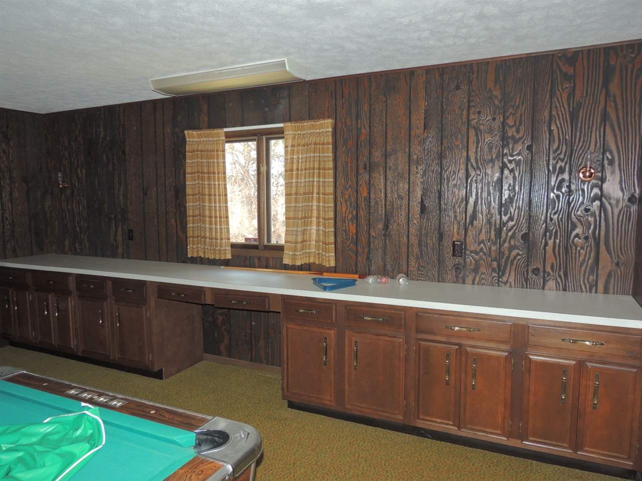 8344 South Schroeder Road Clinton, WI 53525 - Photo 15 of 25 a view of a kitchen with wooden floor and a sink