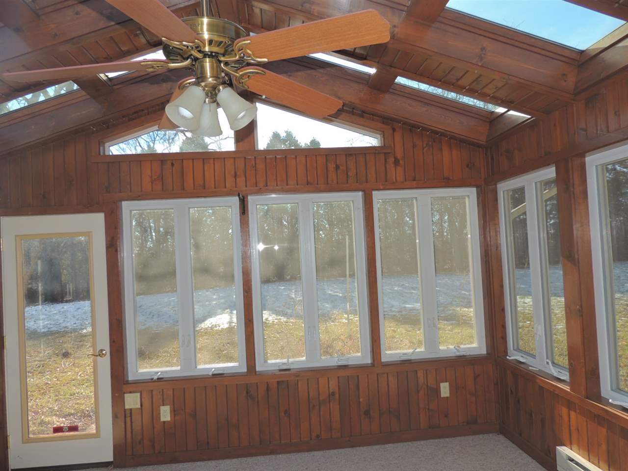 8344 South Schroeder Road Clinton, WI 53525 - Photo 3 of 25 a view of an empty room with a window