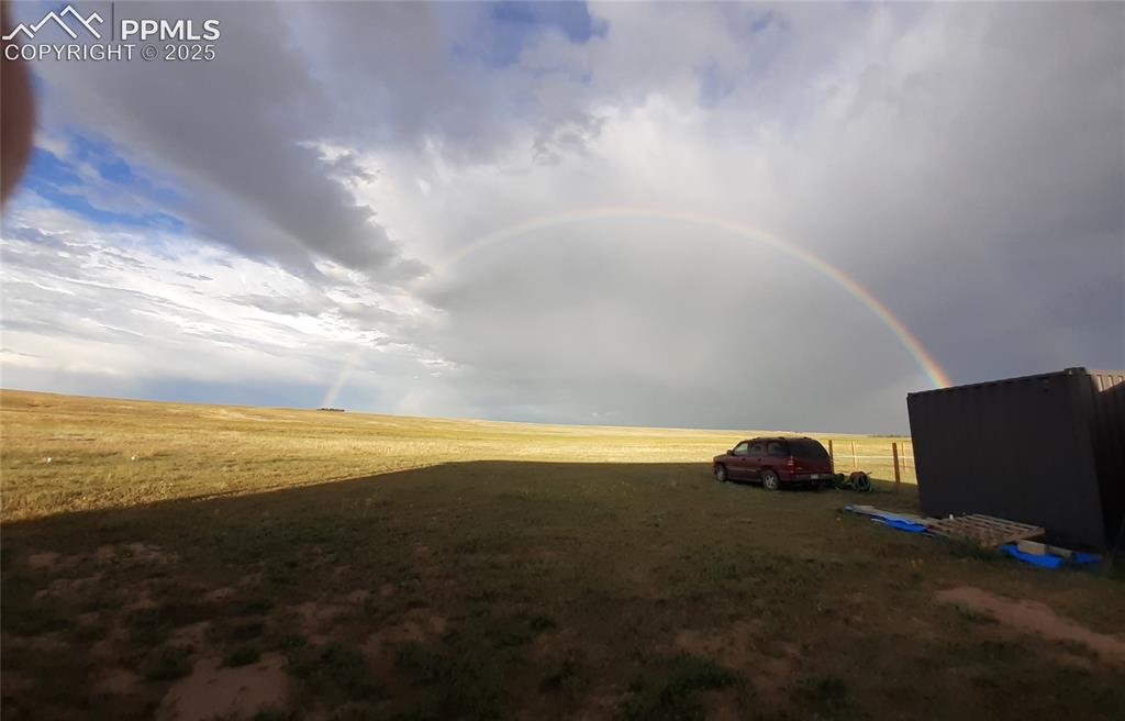12155 Oil Well Road Calhan, CO 80808 - Photo 15 of 28 View of yard with a view of rural / pastoral area