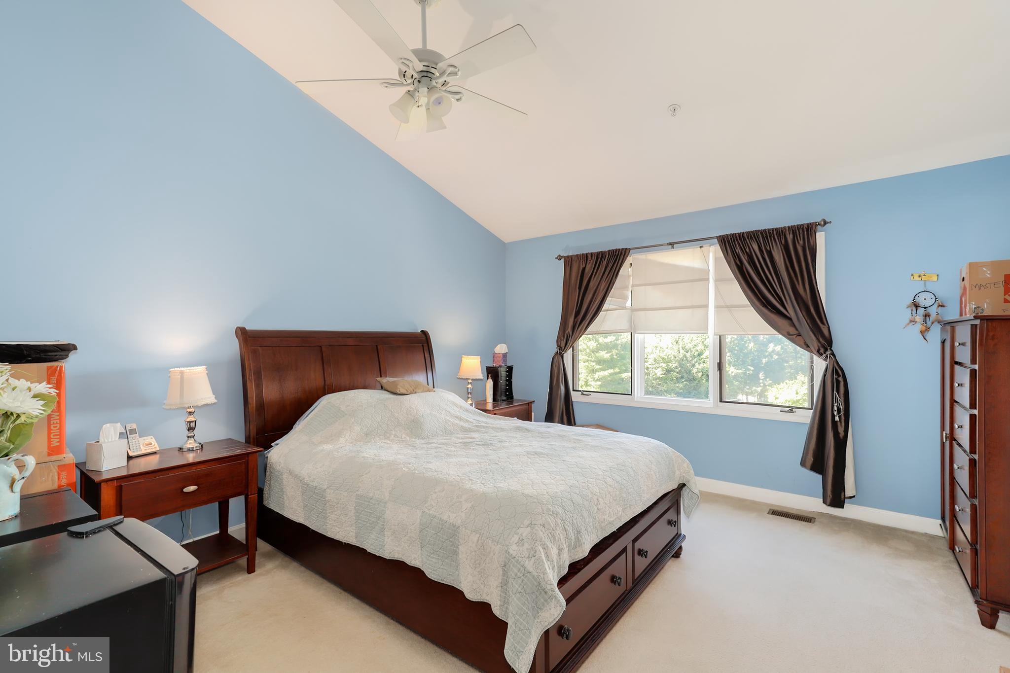 106 Lancefield Road Baltimore, MD 21209 - Photo 17 of 37 a bedroom with a bed and a window