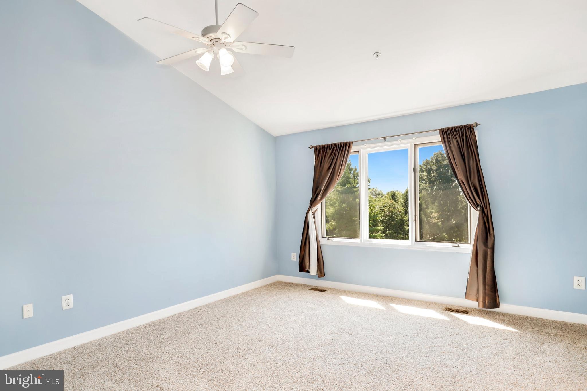 106 Lancefield Road Baltimore, MD 21209 - Photo 19 of 37 a view of an empty room with a window