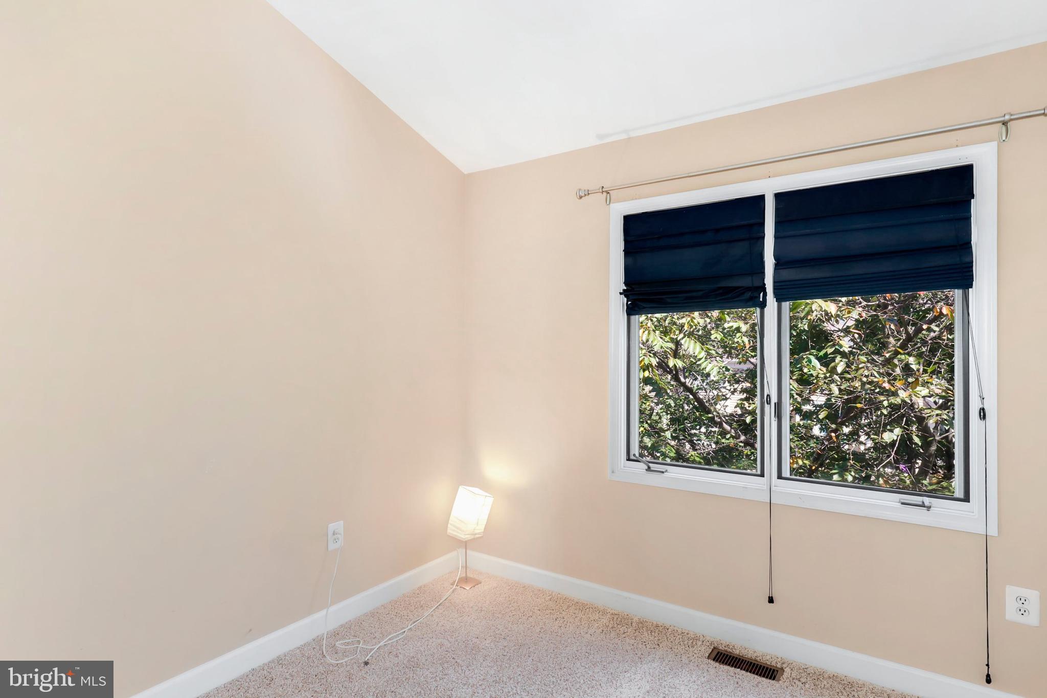 106 Lancefield Road Baltimore, MD 21209 - Photo 24 of 37 an empty room with a window
