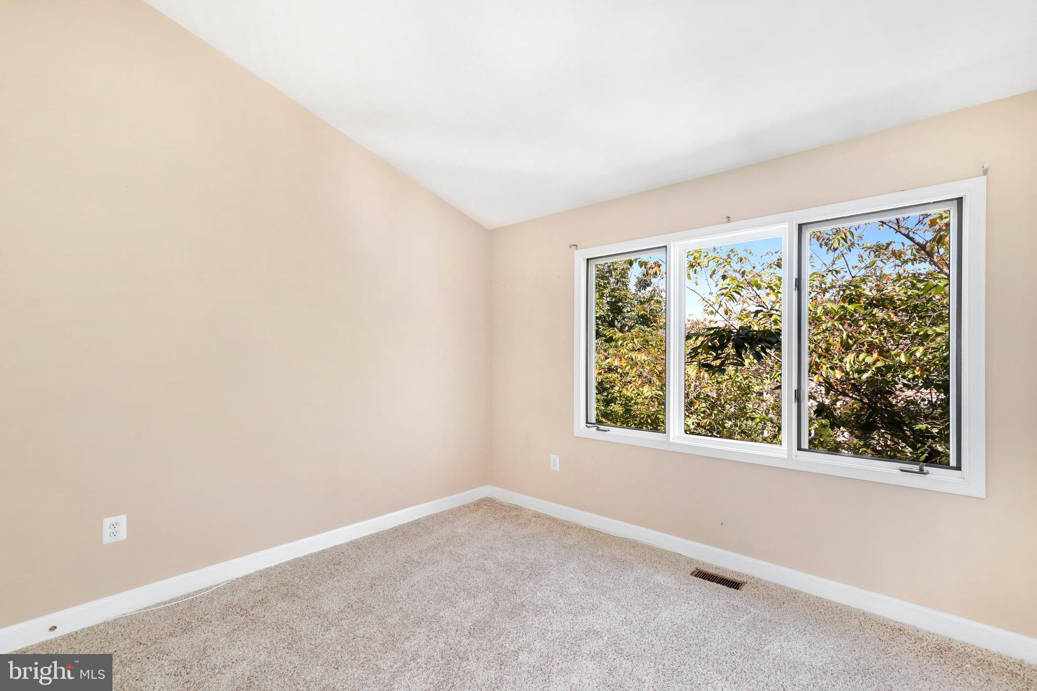 106 Lancefield Road Baltimore, MD 21209 - Photo 25 of 37 an empty room with a window