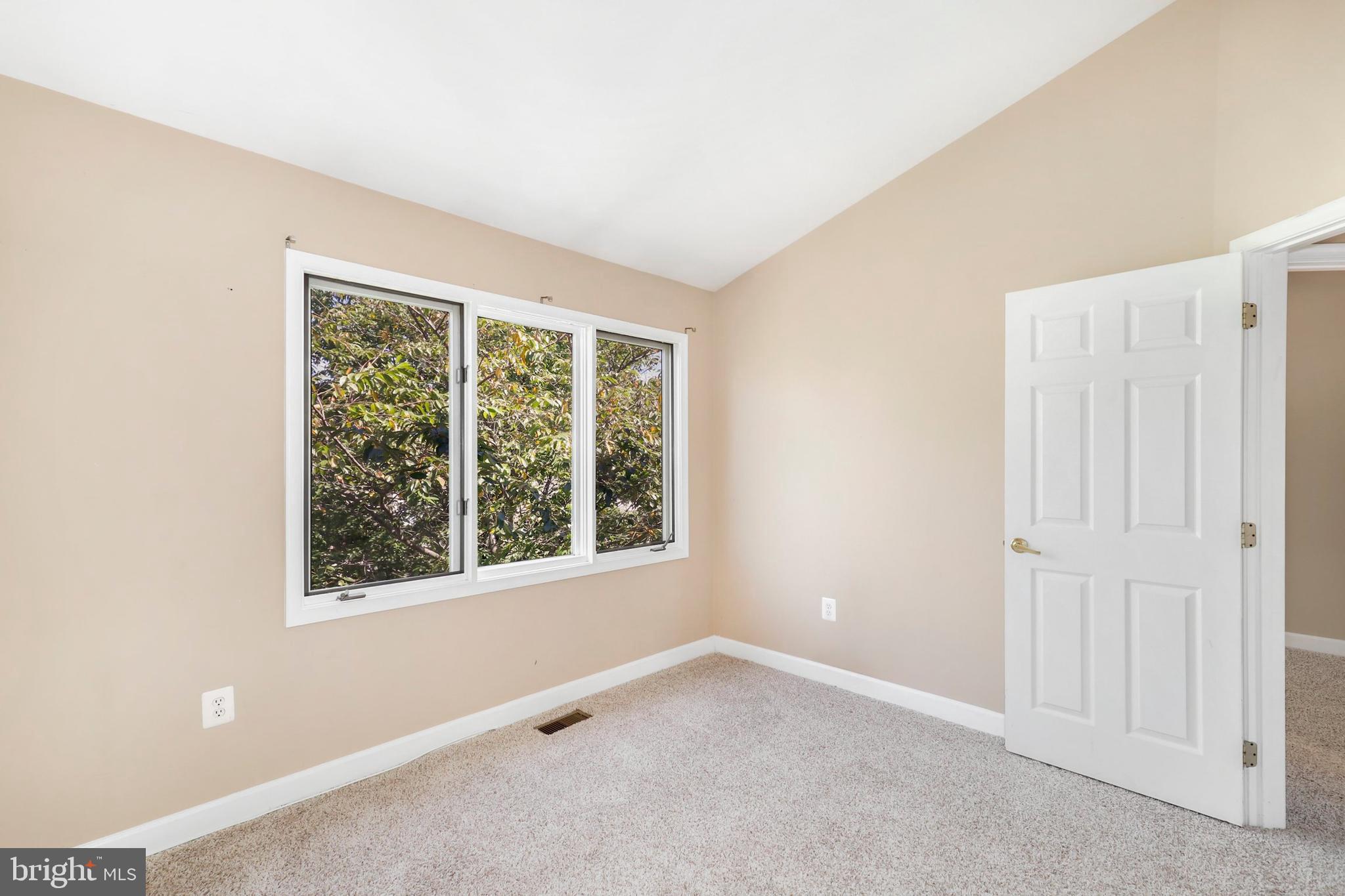 106 Lancefield Road Baltimore, MD 21209 - Photo 26 of 37 an empty room with a window