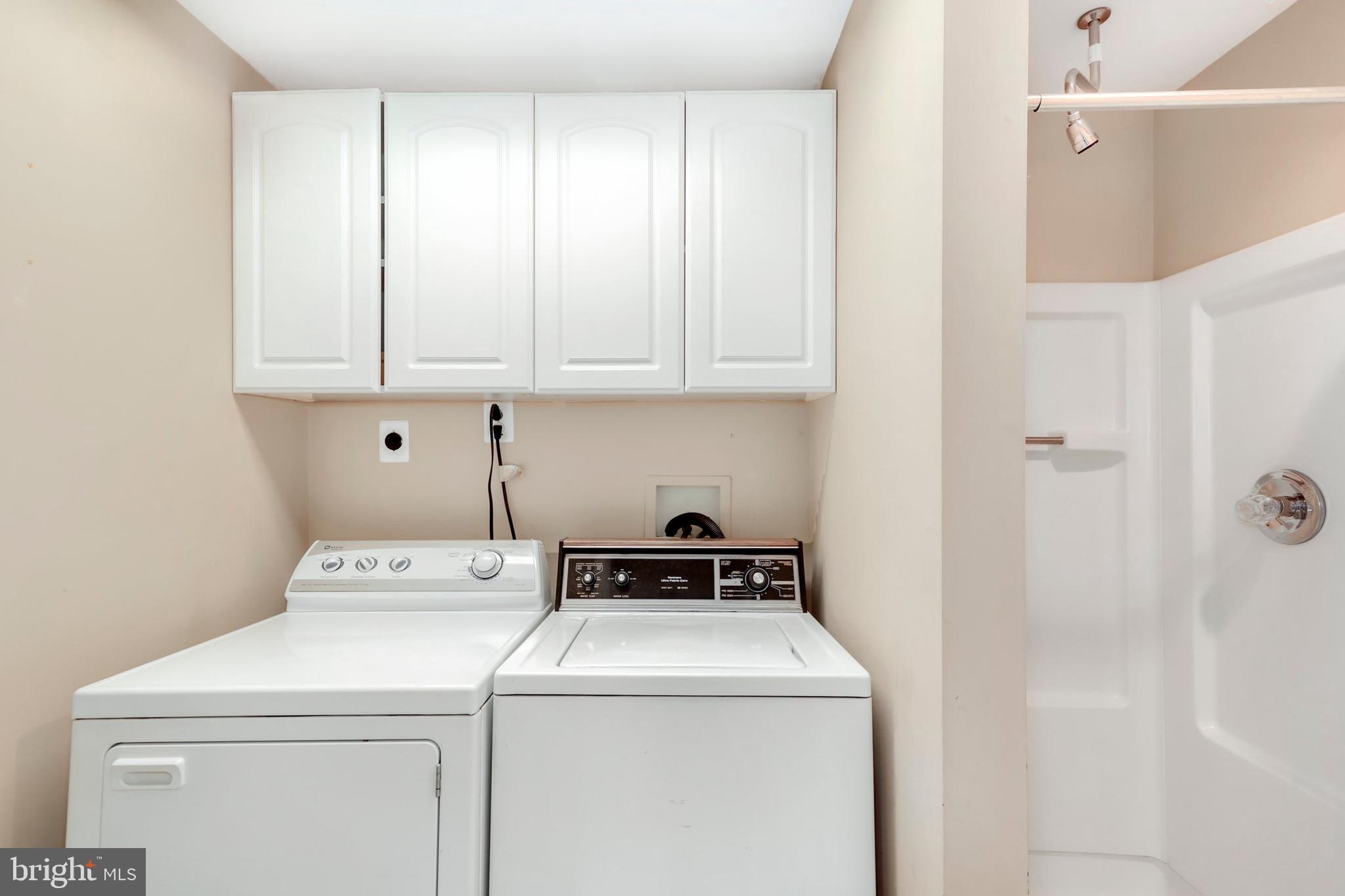 106 Lancefield Road Baltimore, MD 21209 - Photo 31 of 37 a utility room with dryer and washer