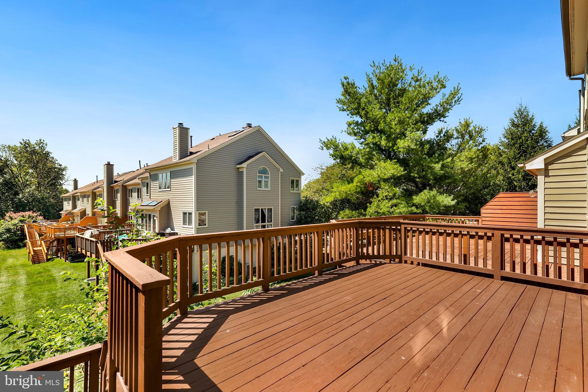 106 Lancefield Road Baltimore, MD 21209 - Photo 36 of 37 a view of a wooden deck with chairs