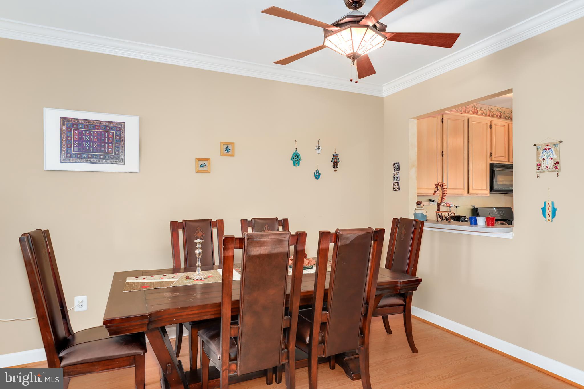 106 Lancefield Road Baltimore, MD 21209 - Photo 8 of 37 a view of a dining room with furniture
