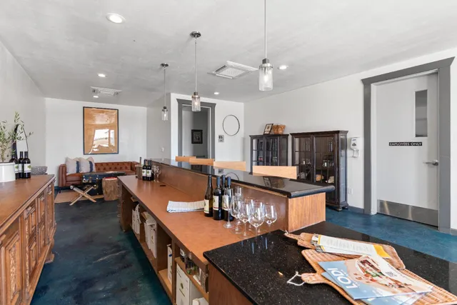 a view of balcony with furniture