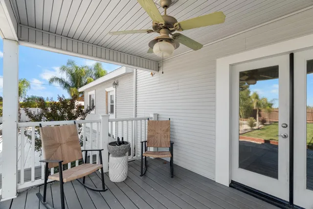 a spacious bedroom with a bed and a fireplace