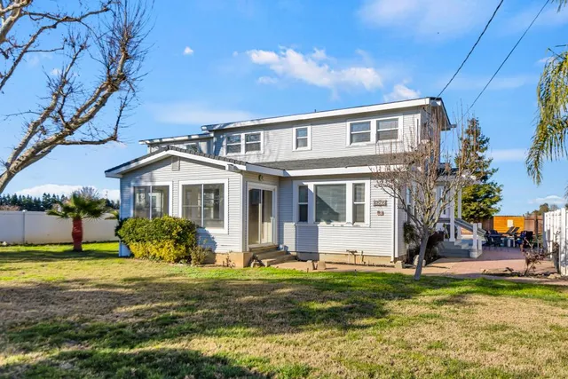 a view of outdoor space with deck and garden